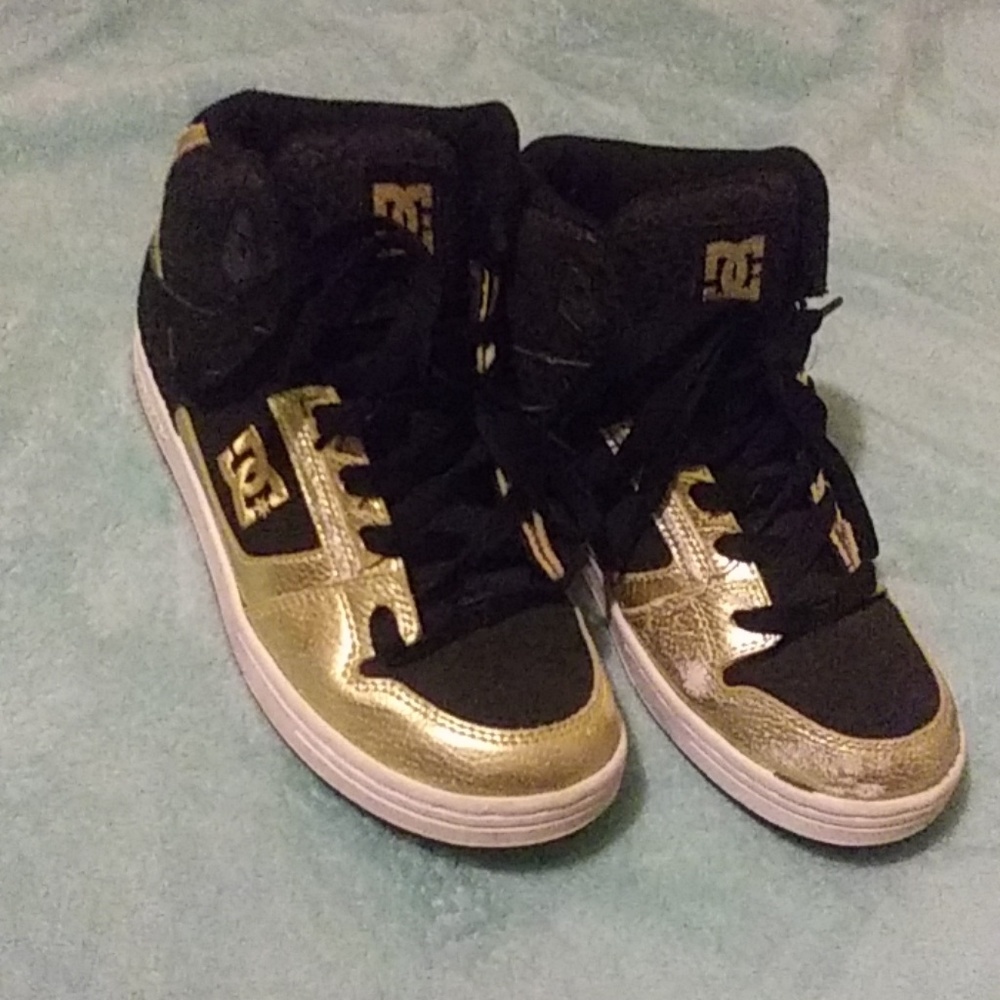 Kids gold and black shoes